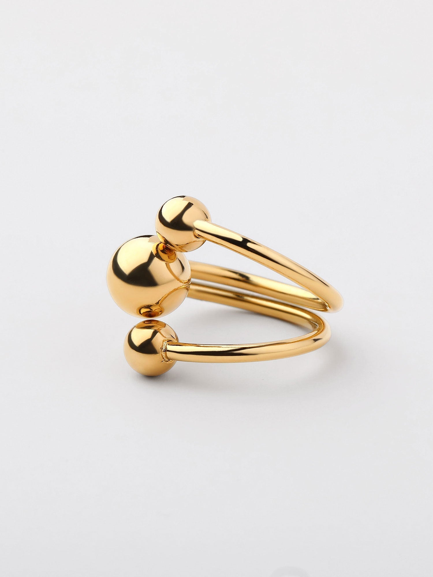 Anillo doble con bolitas Dorado
