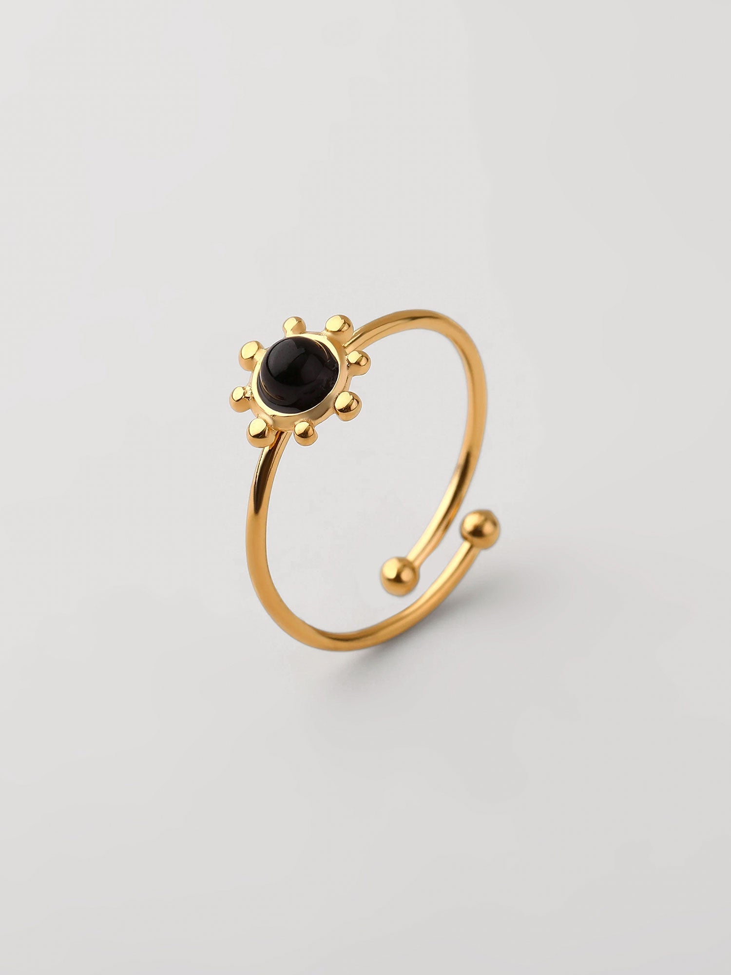Anillo piedra negra natural abierto Dorado