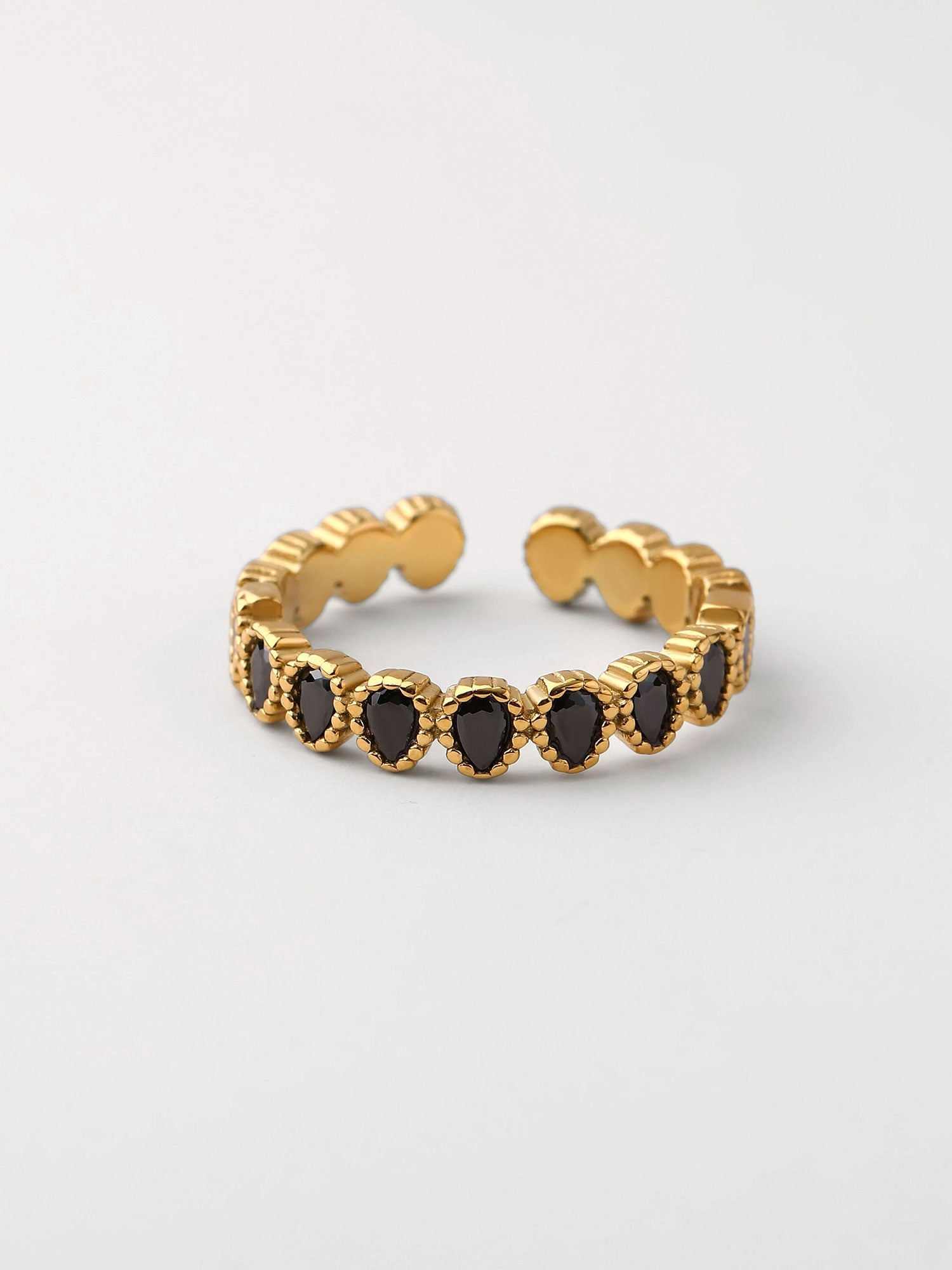 Anillo ajustable Sola zirconias negras dorado