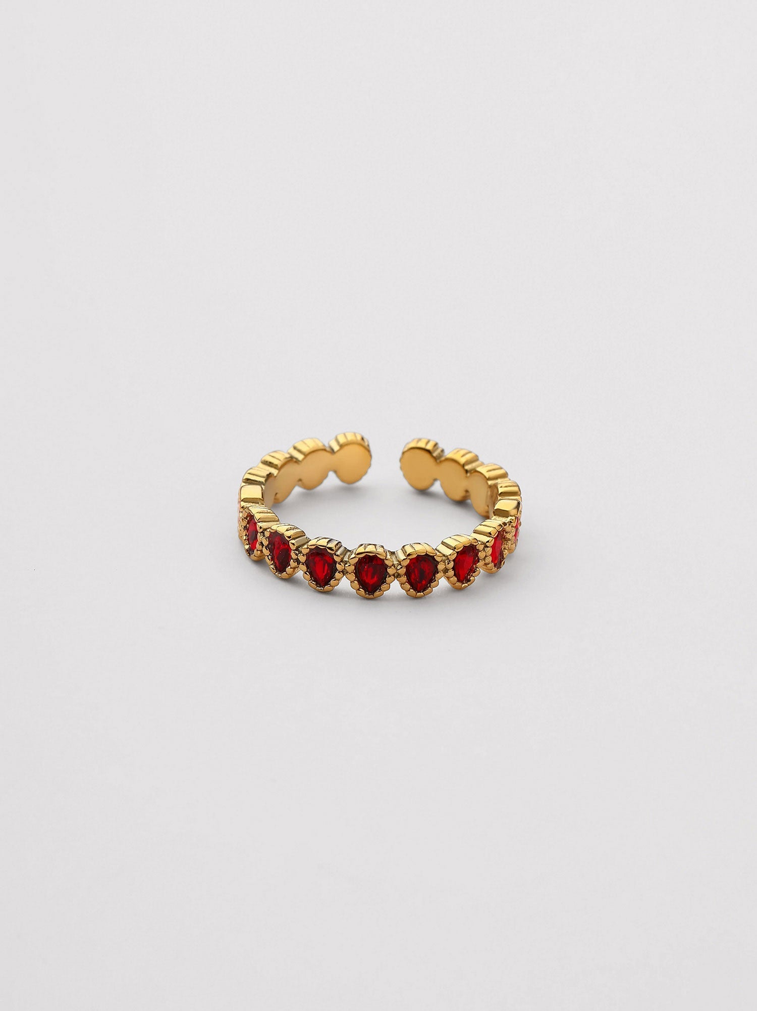 Anillo ajustable Sola zirconias rojas dorado
