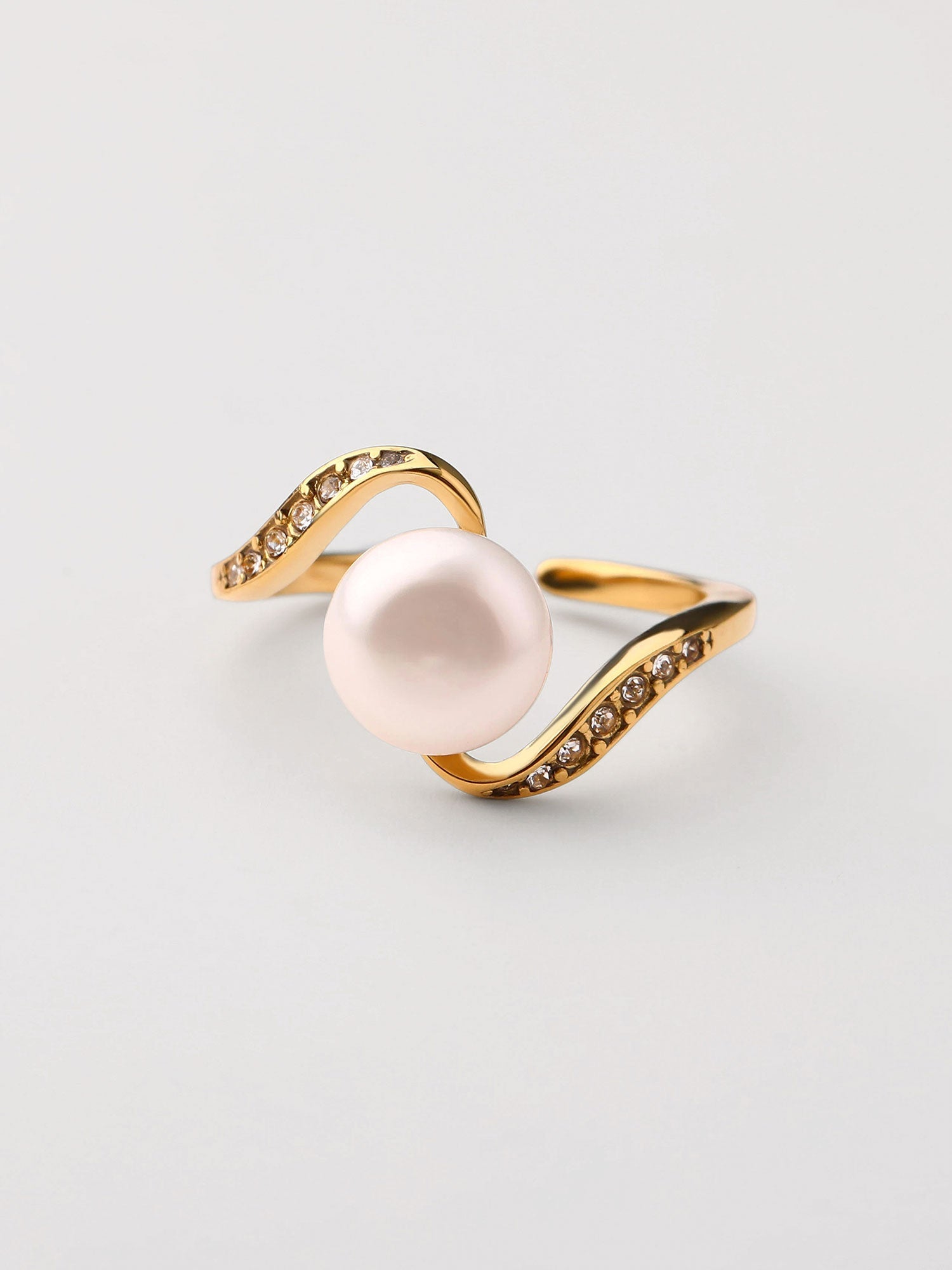 Anillo perla con zirconias Dorado