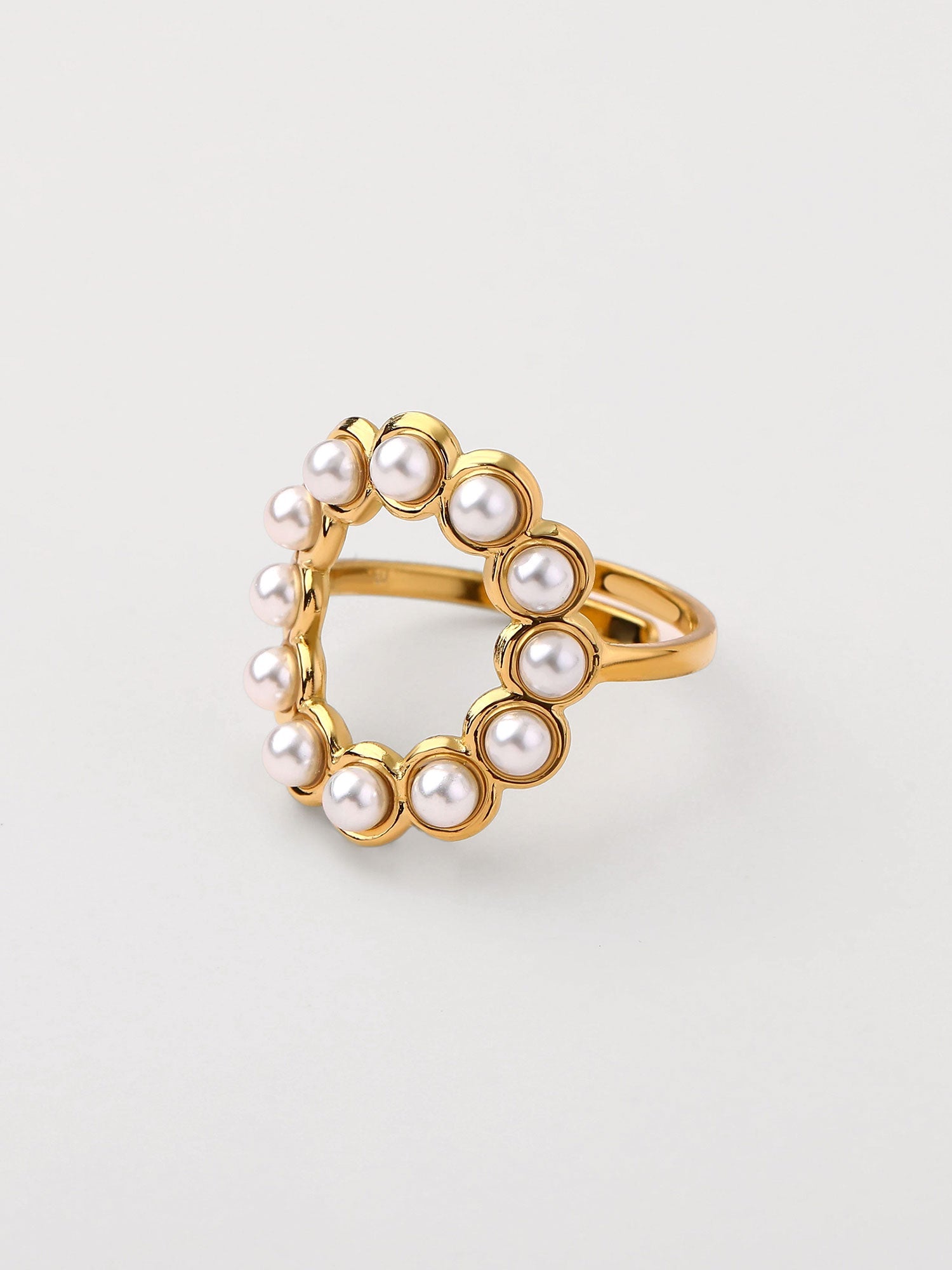 Anillo perla con cadena y zirconia Dorado