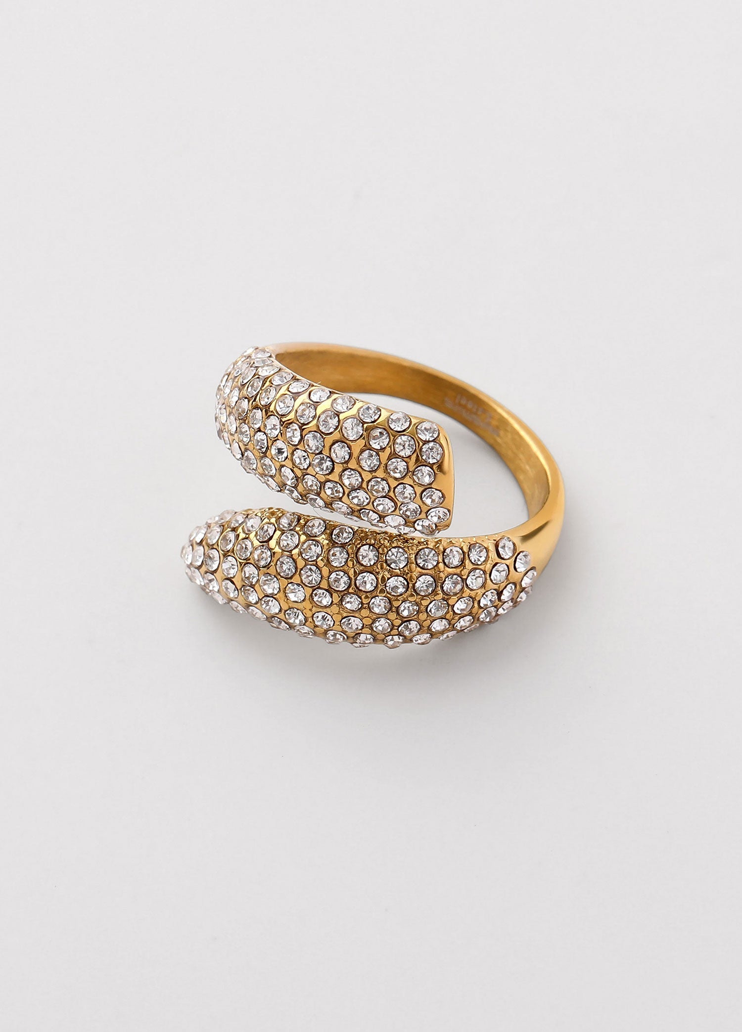 Anillo con zirconias blancas Dorado