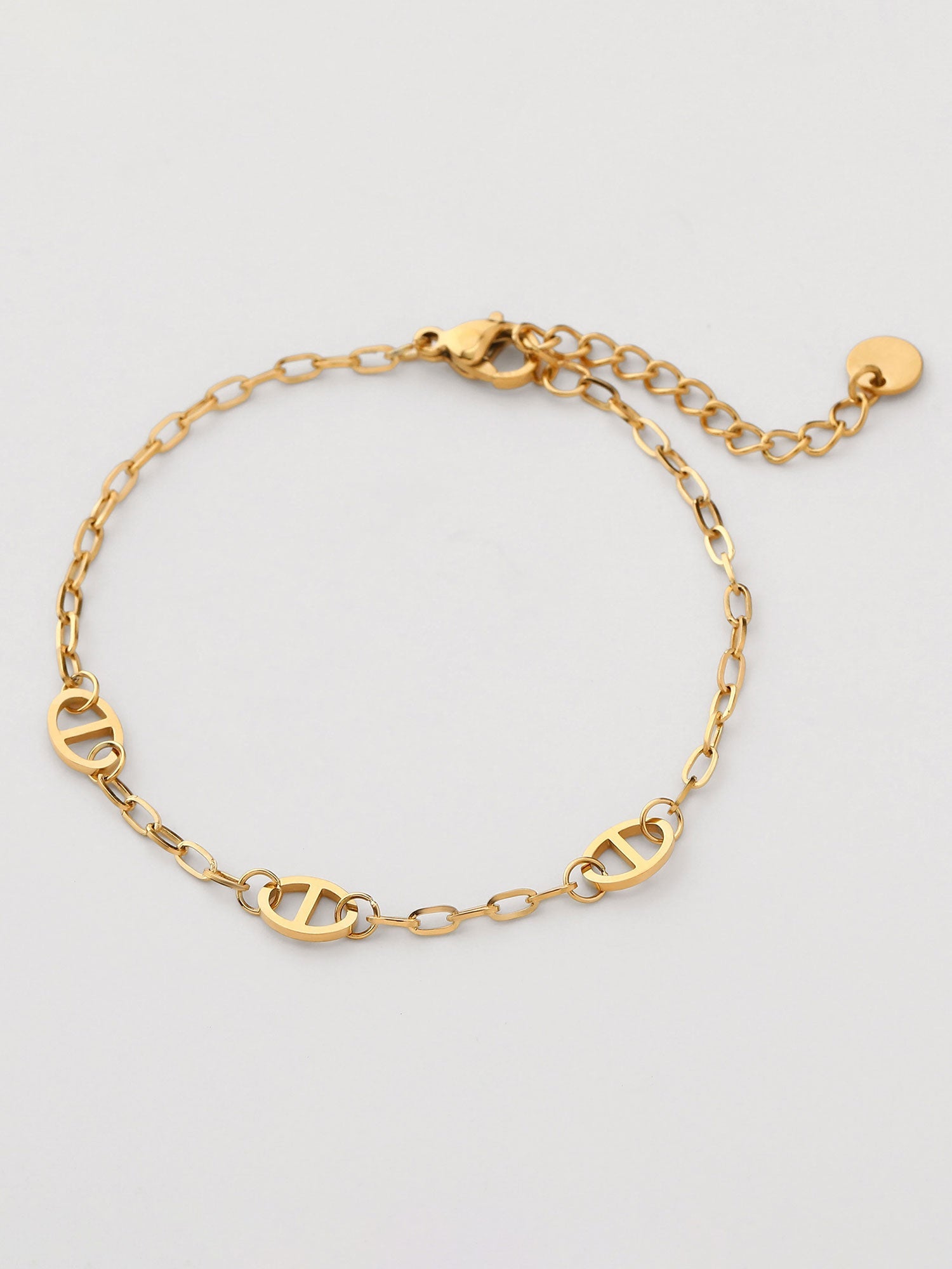 Pulsera cadena fina con figuras dorada
