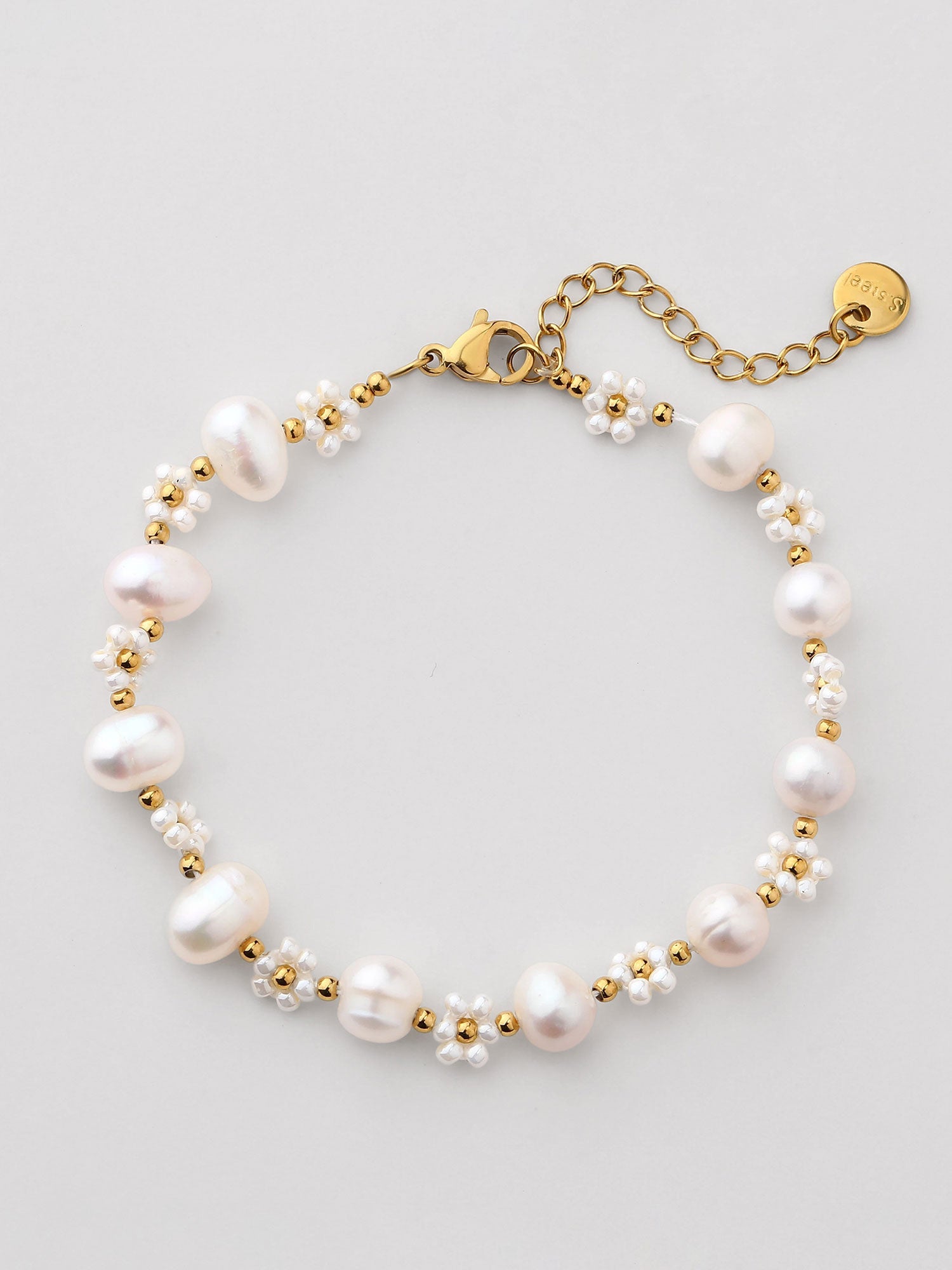Pulsera de perla dorada