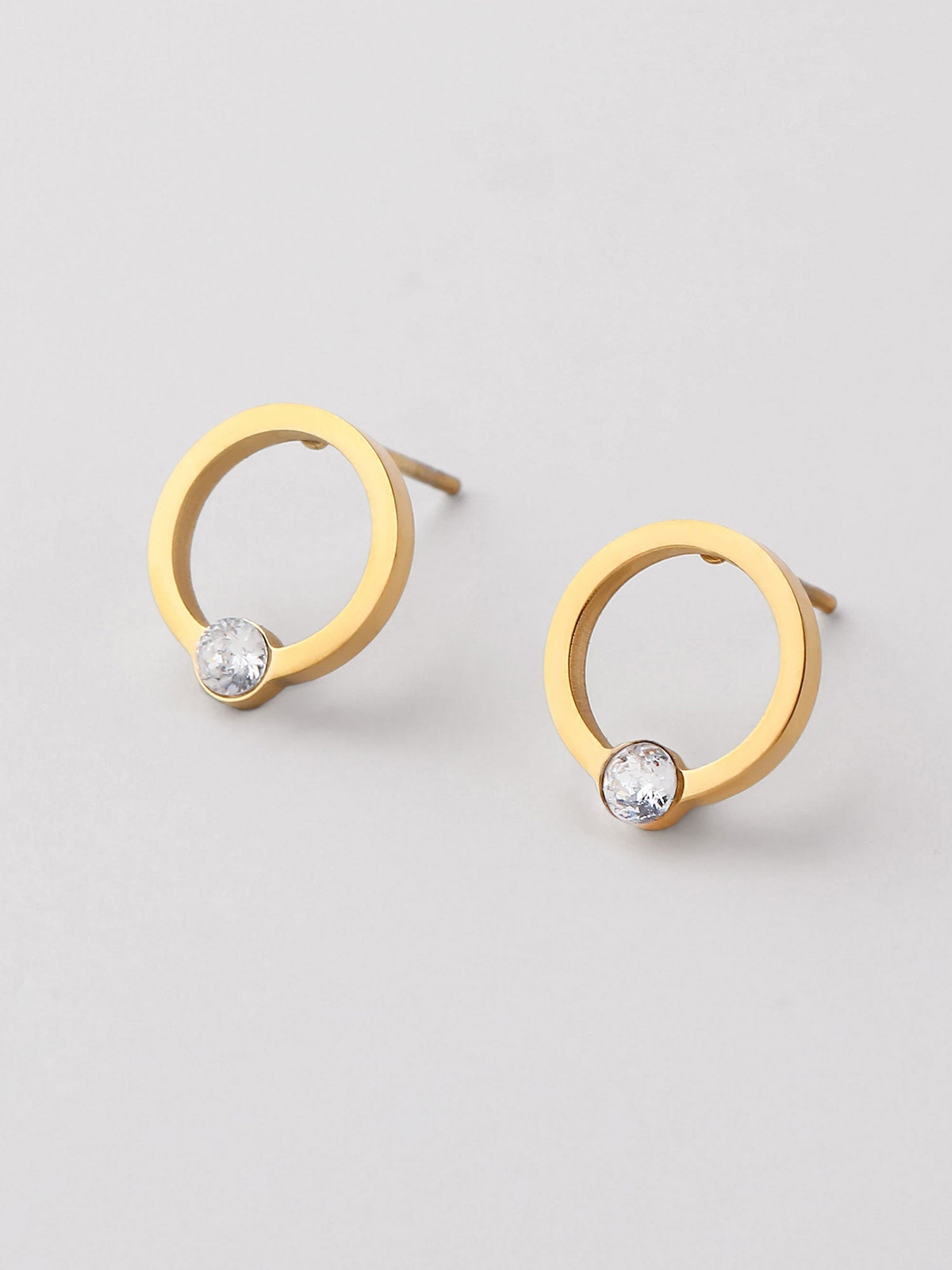 Pendientes redondos zirconia dorados