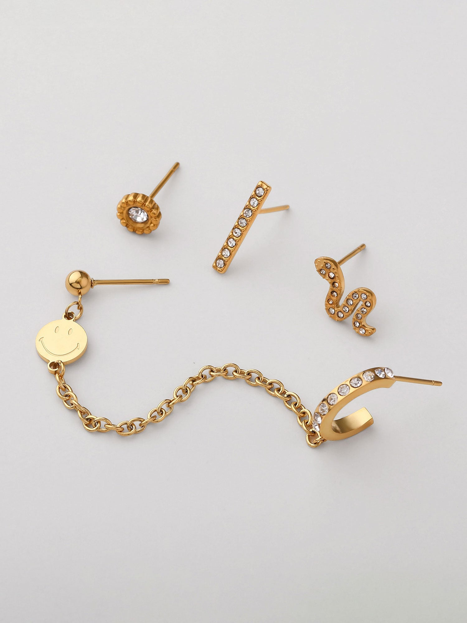 Mix de pendientes Leora ear cuff dorados