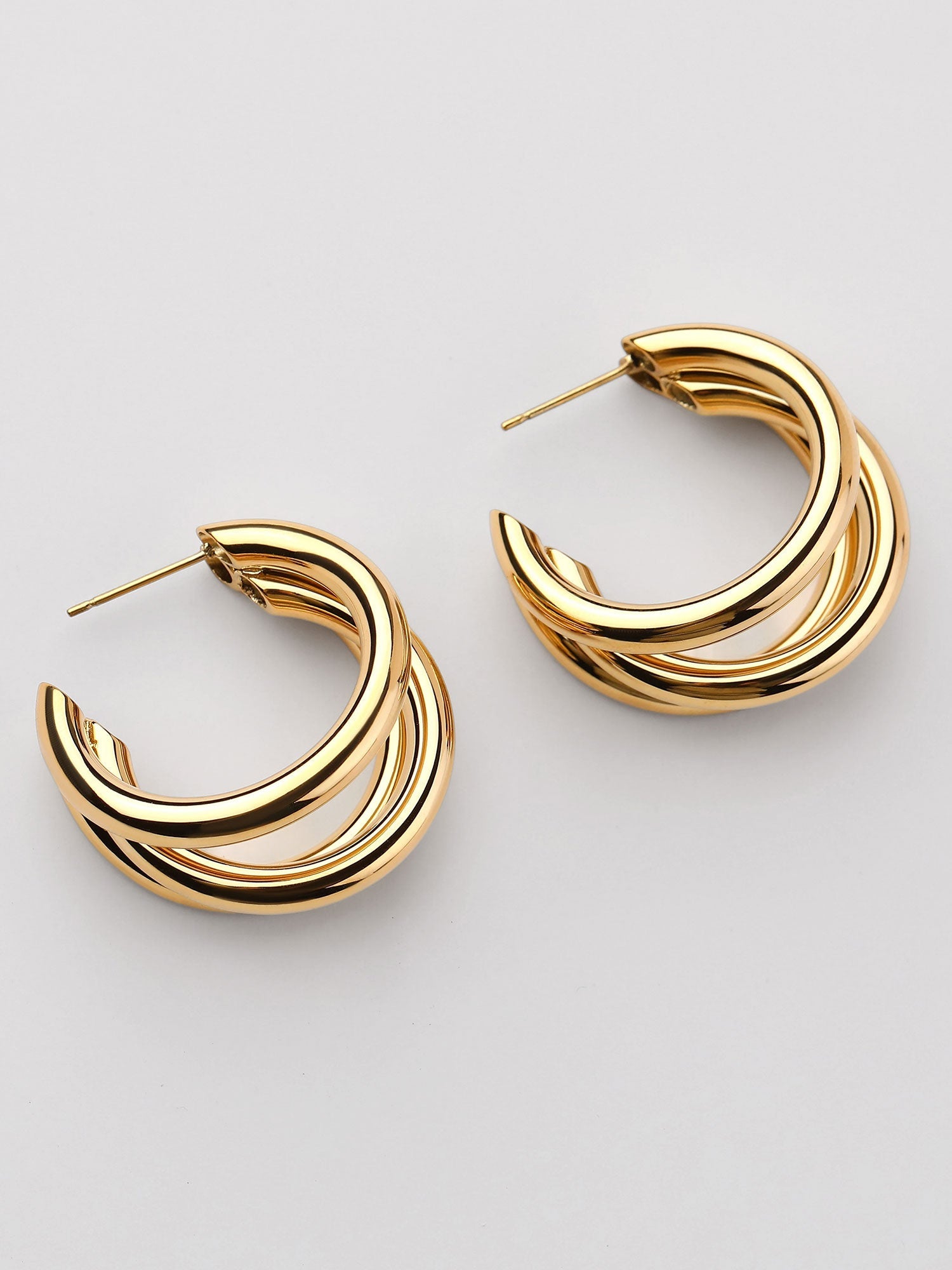 Pendientes aro triple Cara dorados