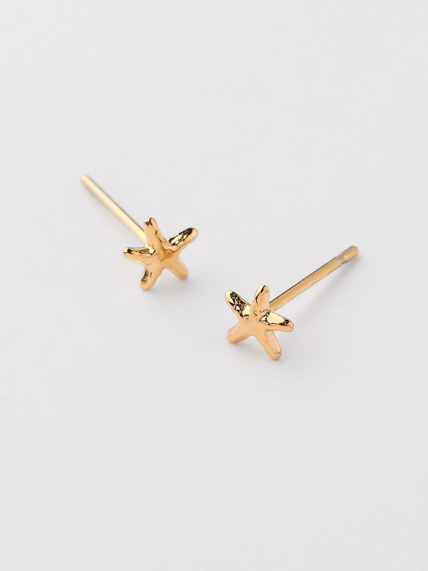 Pendientes Oria forma estrella de mar dorados