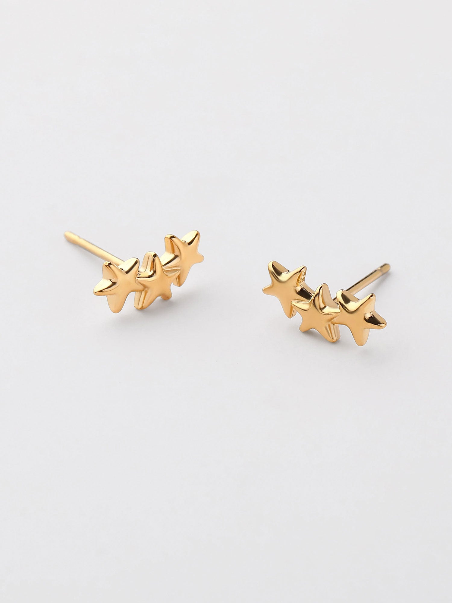 Pendientes mini 3 estrellas dorados