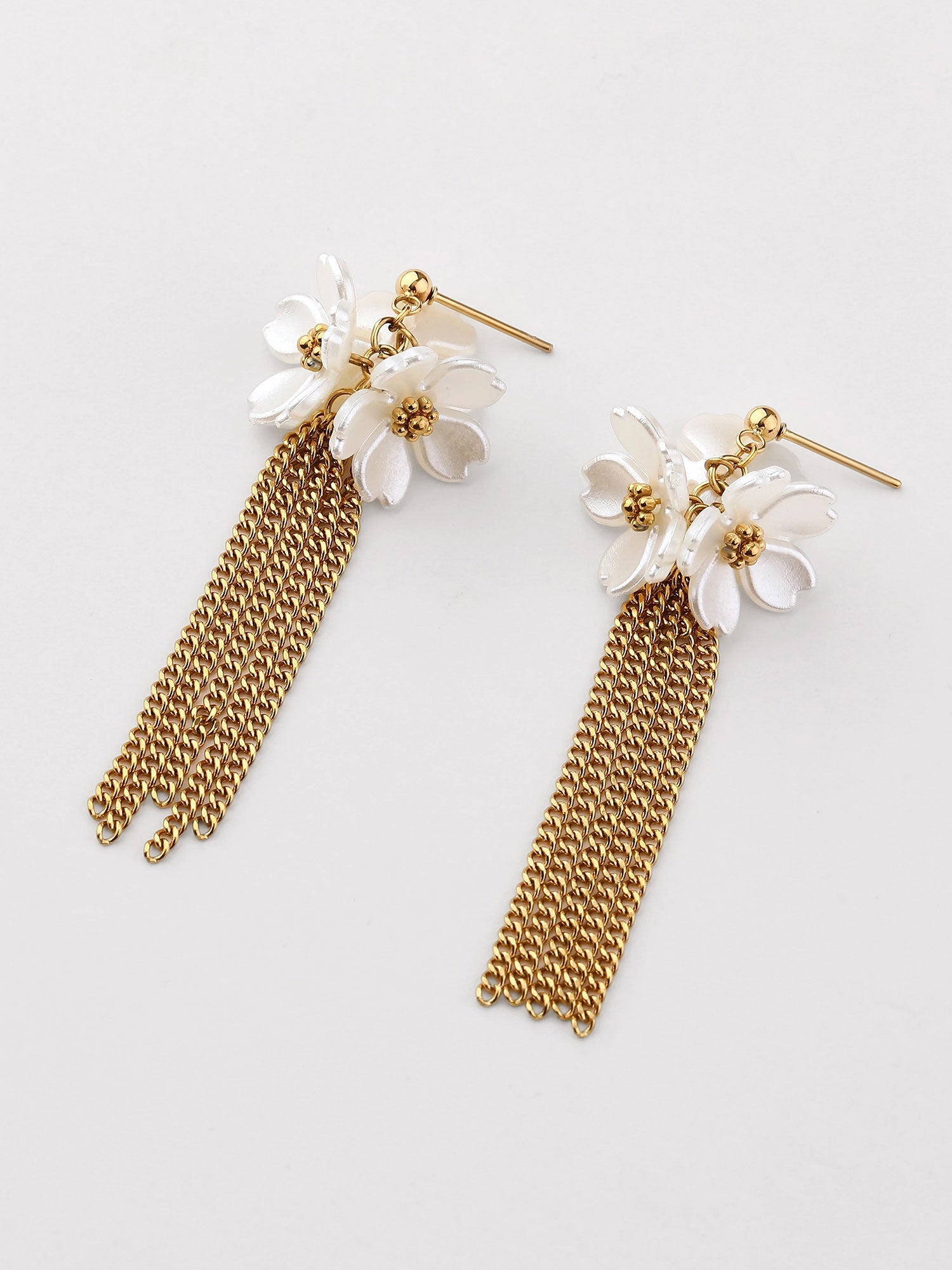 Pendientes Kiena con flor de nácar y colgante dorados