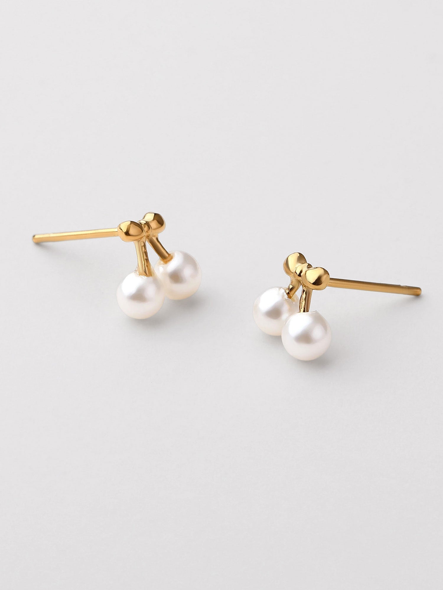 Pendientes de perla Nina forma cereza dorados