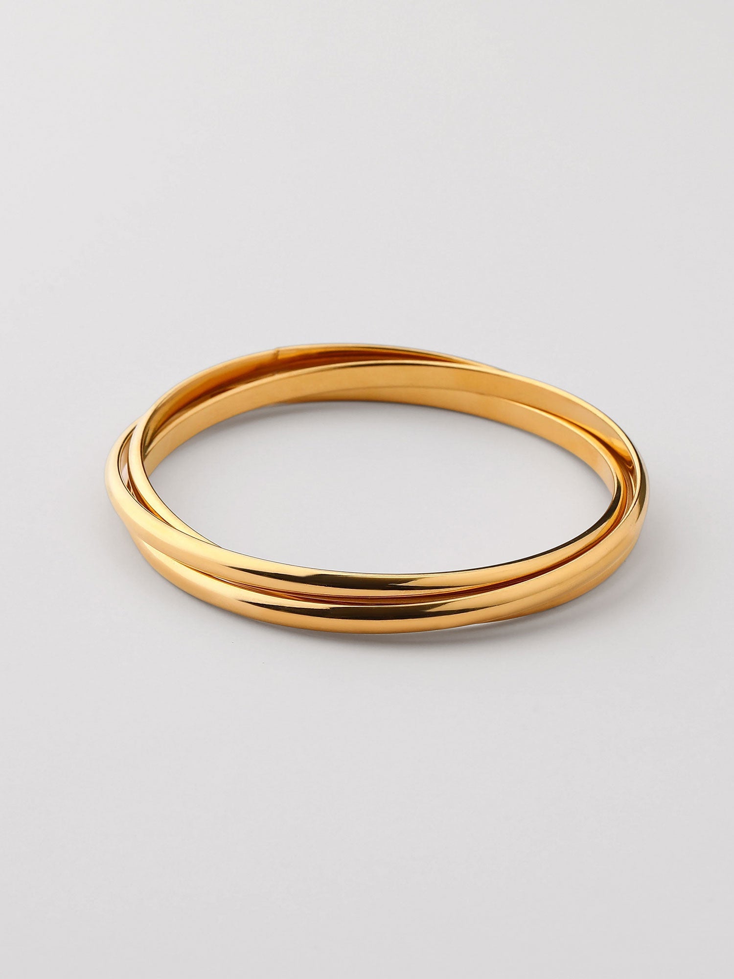 Brazalete triple Iria liso dorado